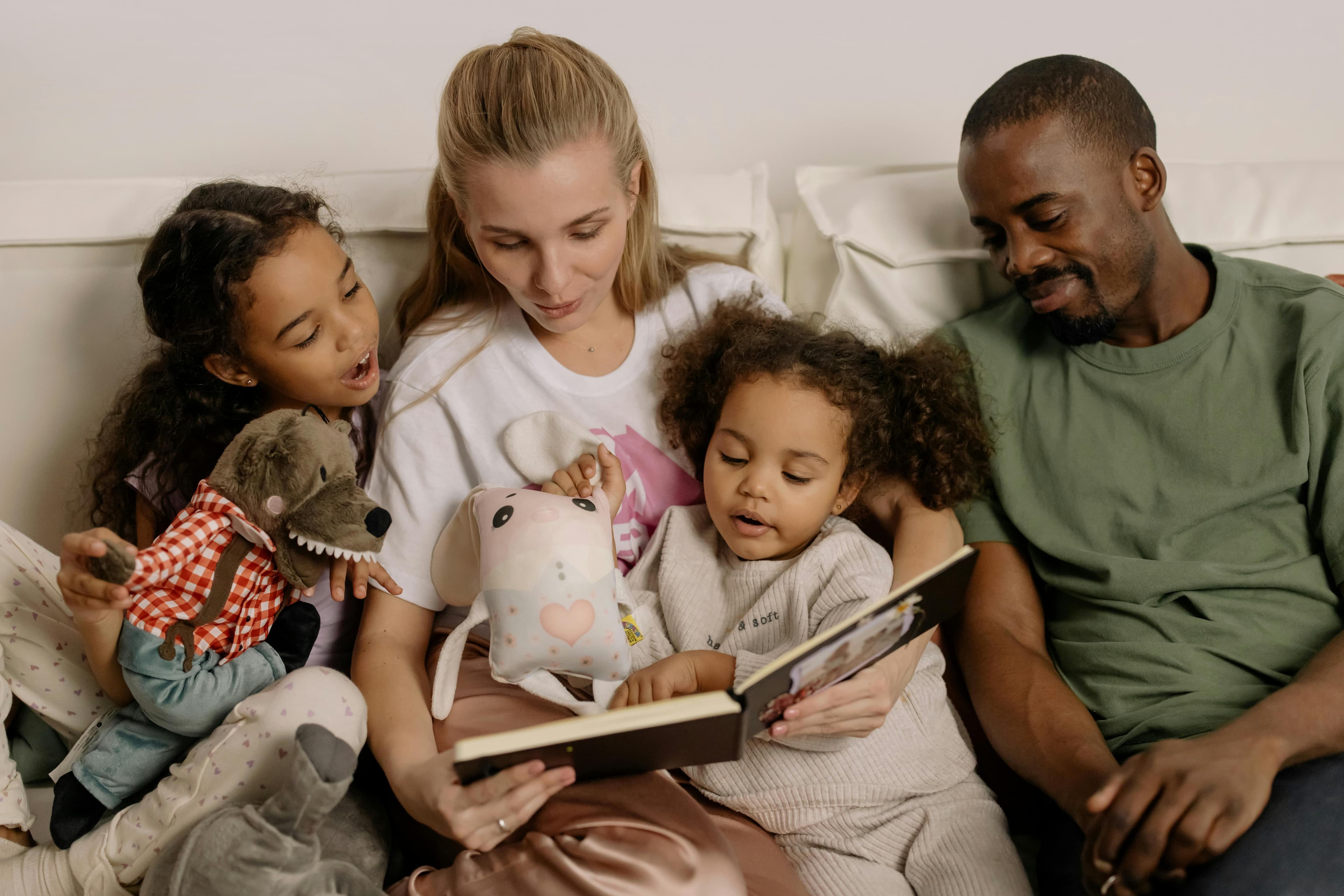 Family reading together at home